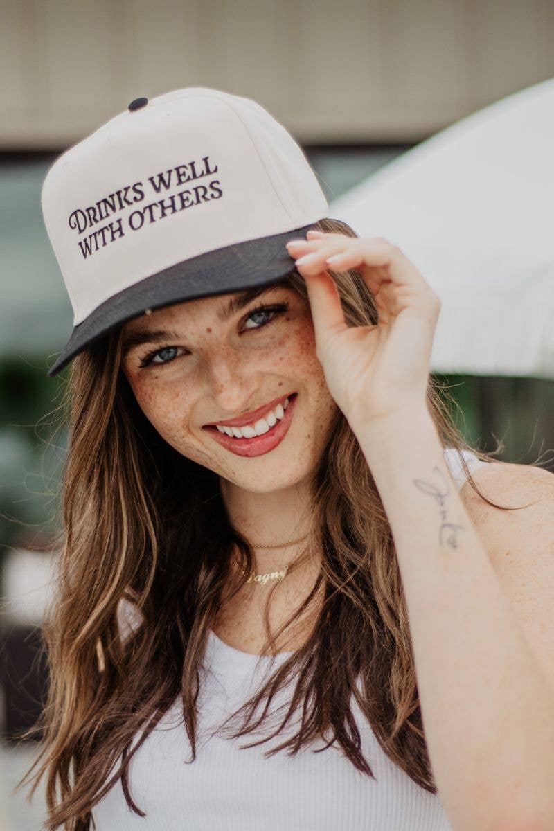 'Drinks Well With Others' Vintage Trucker Hats For Women Grads